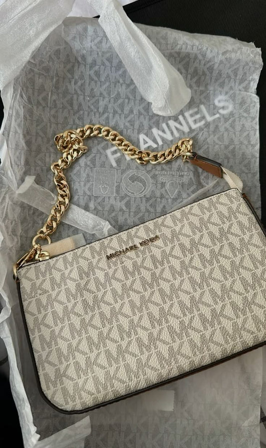 Michael Kors Outlet
Sac à bandoulière Jet Set de taille moyenne en cuir Saffiano